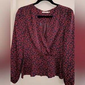 Peplum top.  Silky. Blue with red.